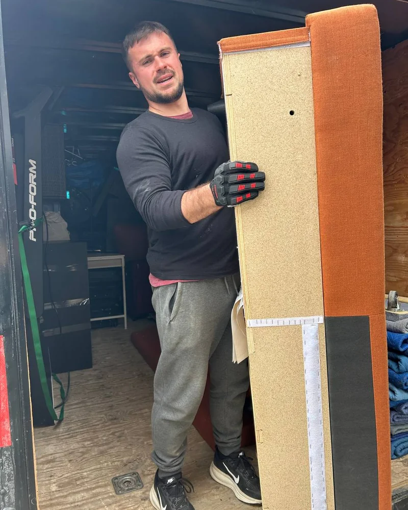 Crystal Touch moving team lifting furniture