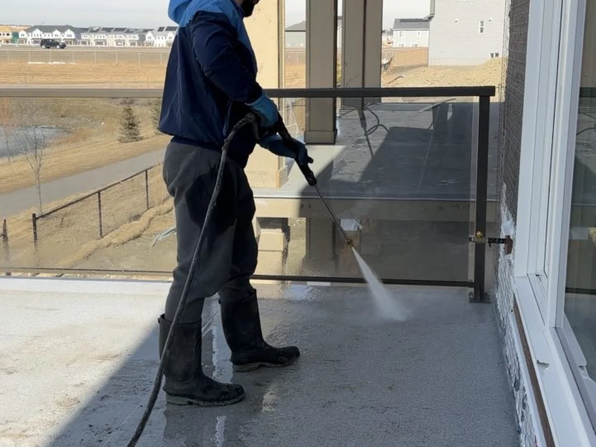 Balcony pressure washing in new construction home